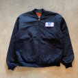 画像1: 【XL/XXL】CINTAS ジップアップ ワッペン付き ワークジャケット ネイビー■ビンテージ オールド アメリカ古着 MA-1タイプ 裏キルティング (1)
